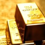 Ouro recua quase 4% após Trump suspender ataques ao Irã por cinco dias